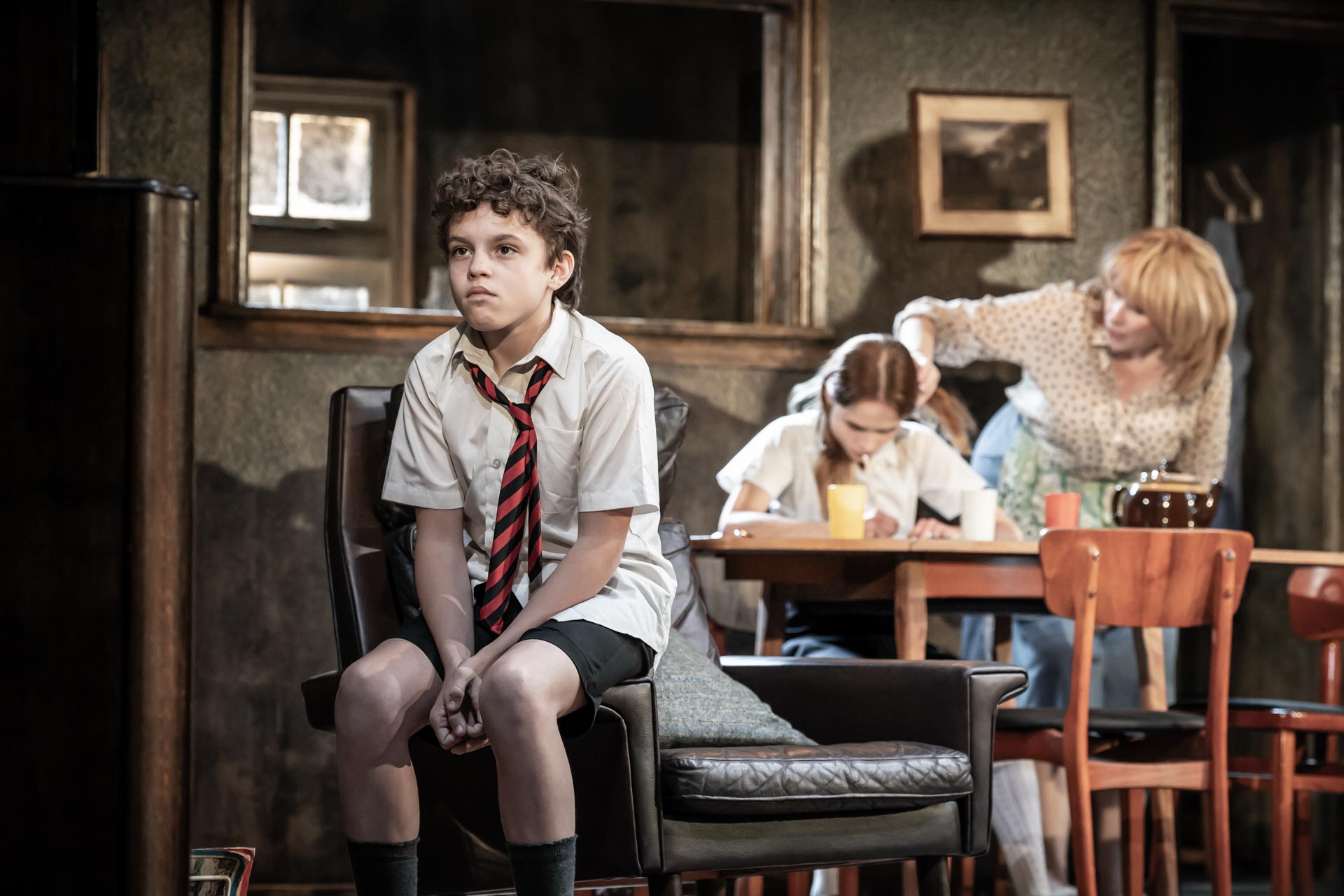 Noah Leggott (Jimmy) Ella Schrey-Yeats (Janet) Catherine Tate (Peggy) in The Enfield Haunting, Photo by Marc Brenner